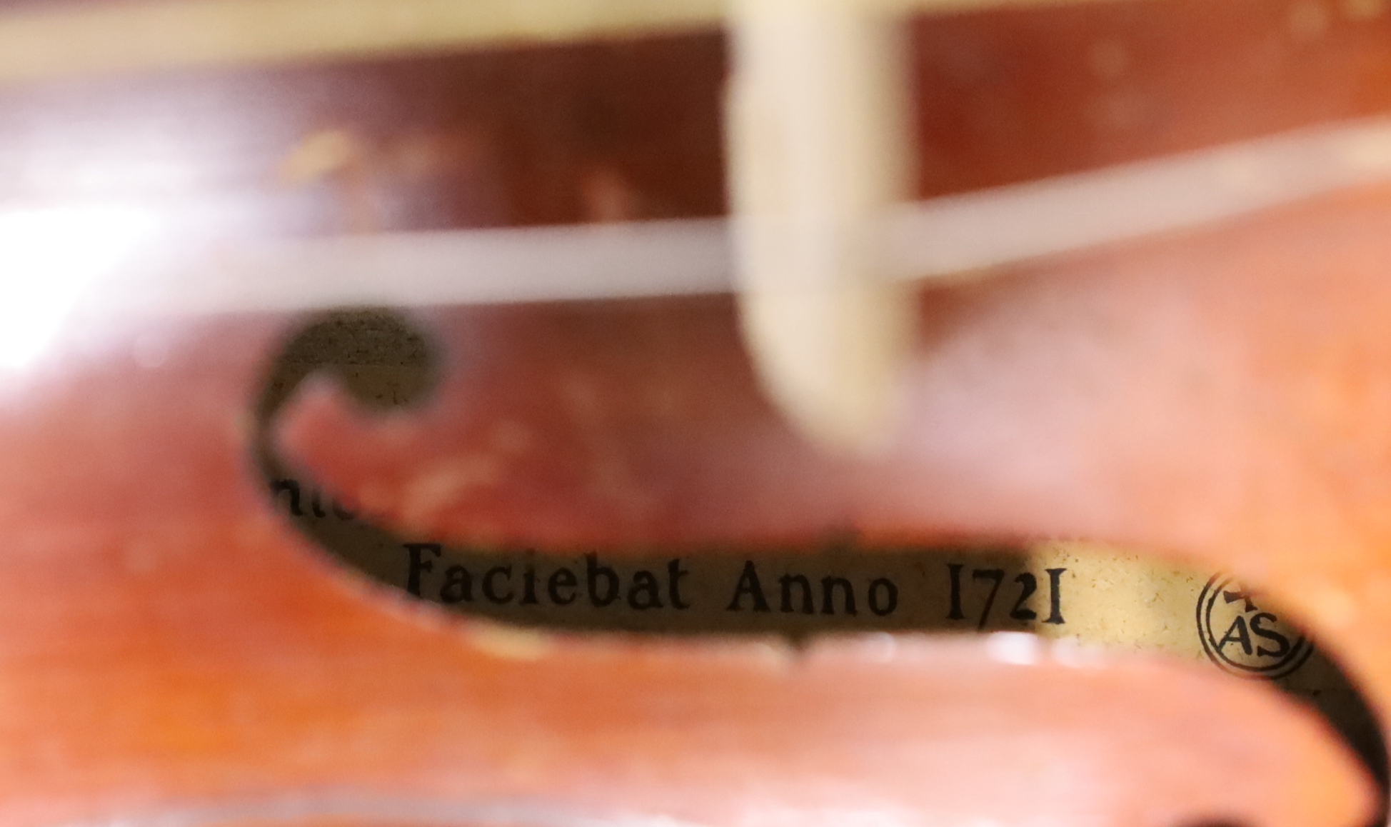 A cased 3/4 sized student violin marked Dresden, with reproduction Stradivarius label
